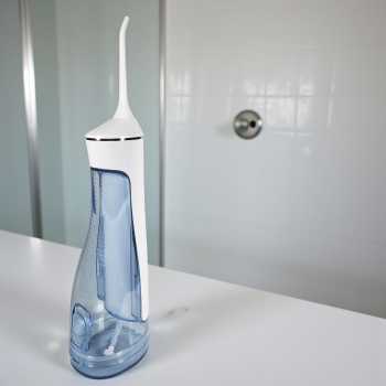 Gambar produk TaffOmicron Water Flosser Dental Irrigator Pembersih Karang Gigi 320ml - BV-612