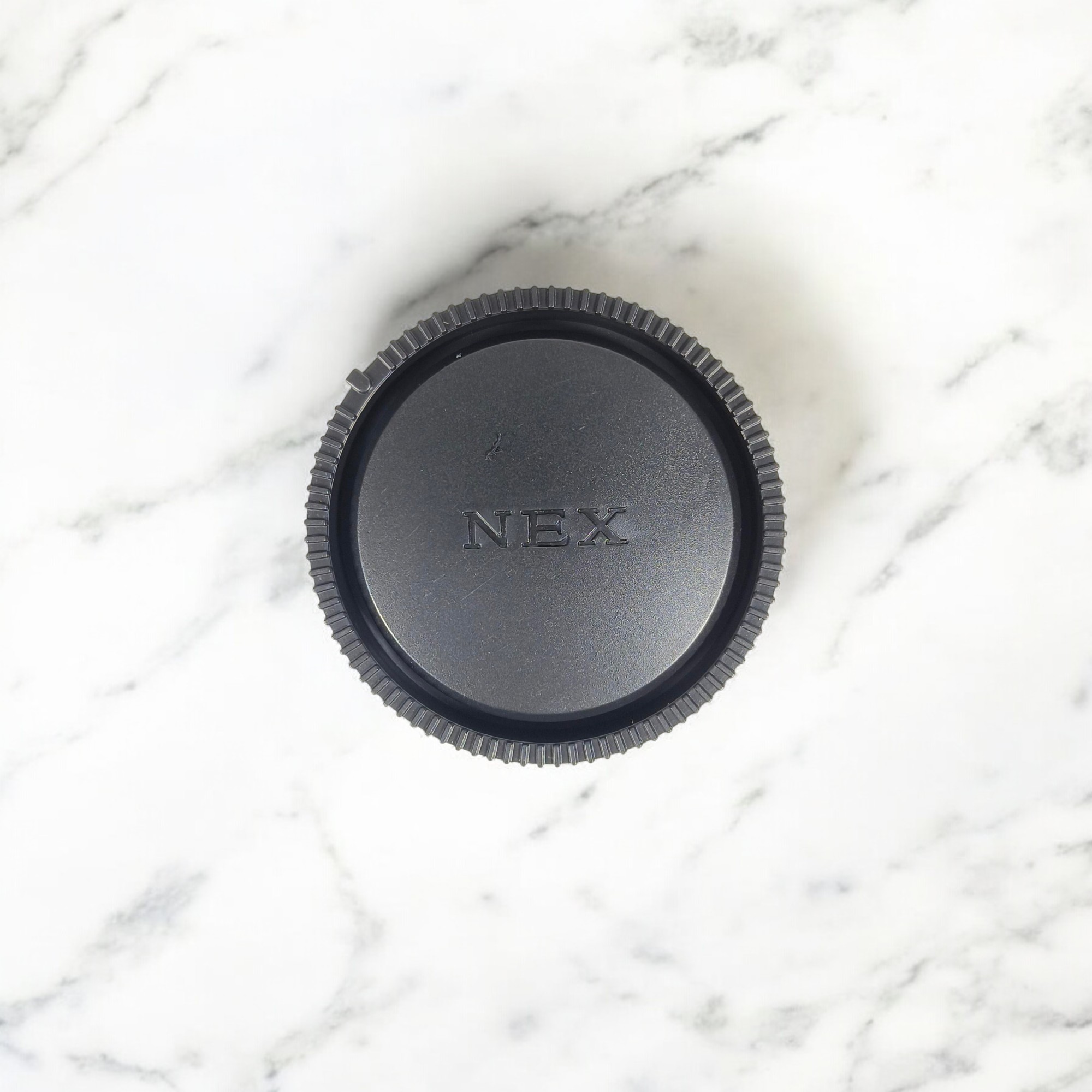 Penutup Body Lensa Kamera Sony NEX-A7 A7M2 A7S A7R a6000 (with Logo) Gambar produk Penutup Body Lensa Kamera Sony NEX-A7 A7M2 A7S A7R a6000 (with Logo)