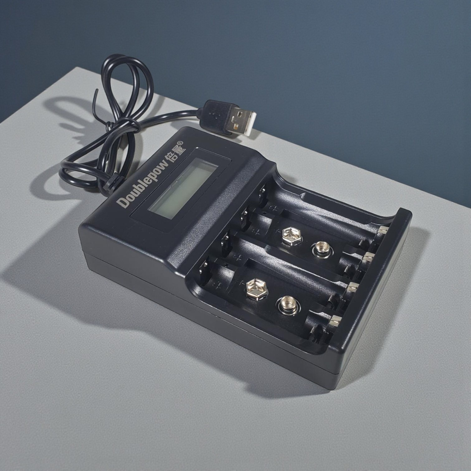 Gambar produk Doublepow Charger Baterai 4 Slot AA AAA 9V Ni-MH Ni-CD Li-Ion with LCD - DP-UK95