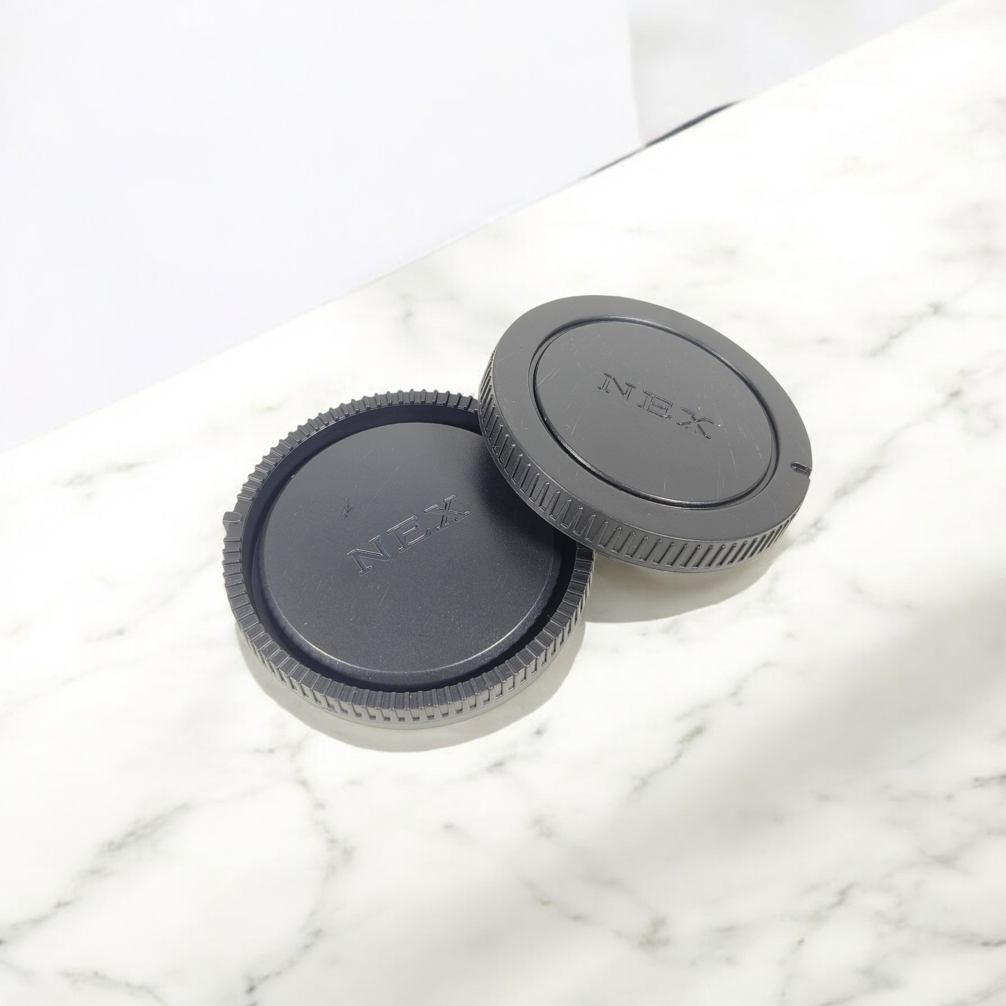 Penutup Body Lensa Kamera Sony NEX-A7 A7M2 A7S A7R a6000 (with Logo) Gambar produk Penutup Body Lensa Kamera Sony NEX-A7 A7M2 A7S A7R a6000 (with Logo)