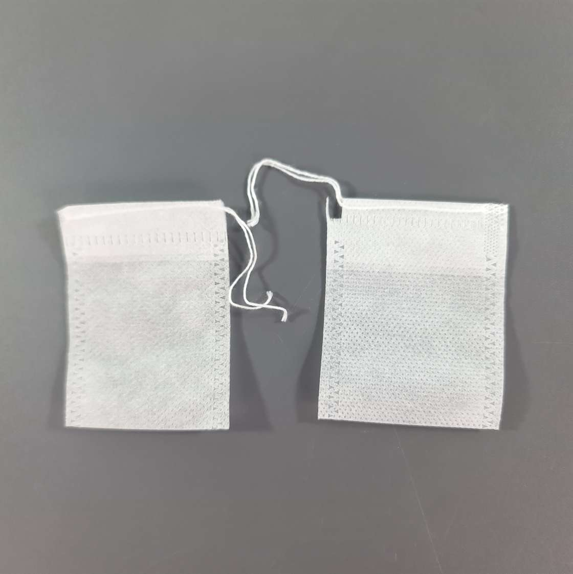 One Two Cups Kantong Filter Saringan Teh Tea Bag Disposable 100 PCS 5.5x7cm - M100 Gambar produk One Two Cups Kantong Filter Saringan Teh Tea Bag Disposable 100 PCS 5.5x7cm - M100