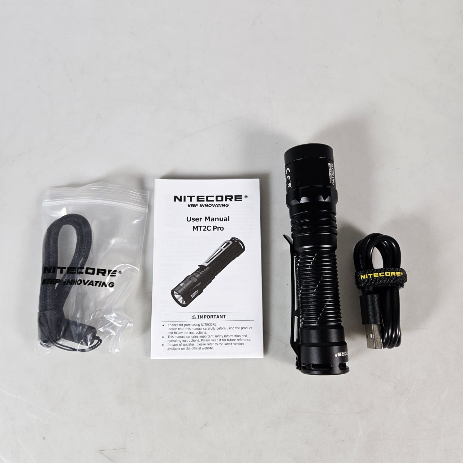 NITECORE Senter LED Tactical Flashlight UHi 20 IP68 1800 Lumens - MT2C PRO Gambar produk NITECORE Senter LED Tactical Flashlight UHi 20 IP68 1800 Lumens - MT2C PRO