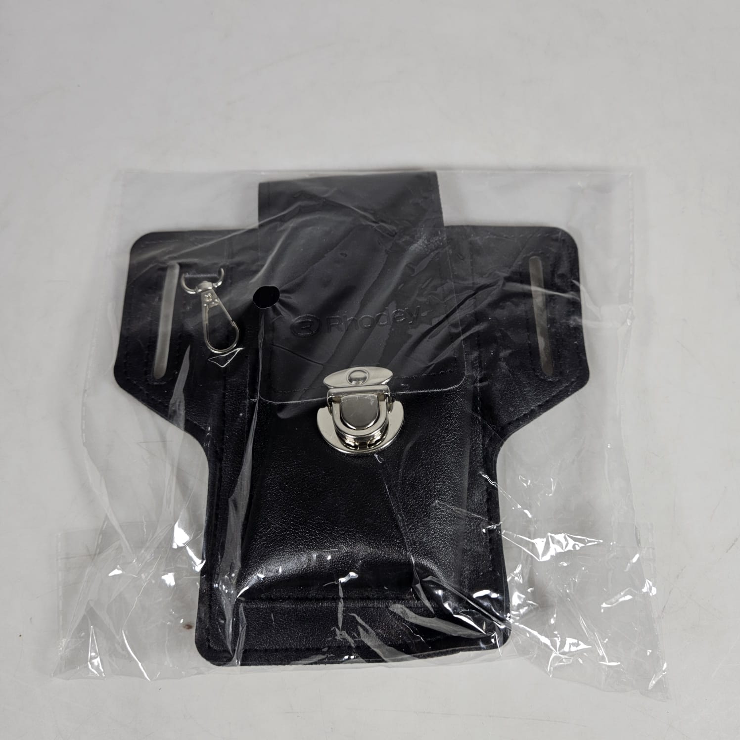 Rhodey Tas Pinggang Sabuk Smartphone Holster PU Leather - FSN25 Gambar produk Rhodey Tas Pinggang Sabuk Smartphone Holster PU Leather - FSN25 - Kemasan