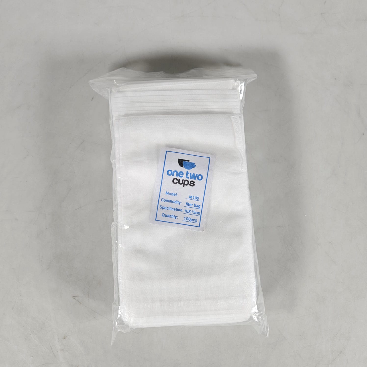 One Two Cups Kantong Teh Filter Saringan Tea Bag Disposable 100 PCS 10x15cm - M100 Gambar produk One Two Cups Kantong Teh Filter Saringan Tea Bag Disposable 100 PCS 10x15cm - M100 - Kemasan