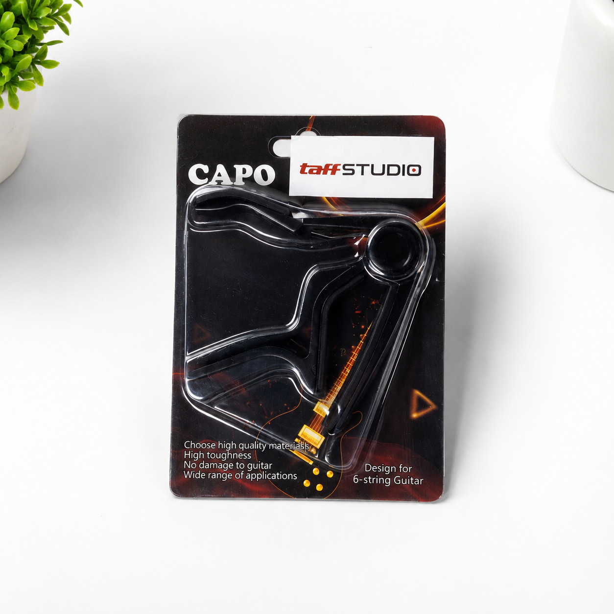 TaffSTUDIO Capo Gitar Ukulele Aluminium Clamp Note Riser - M556 Gambar produk TaffSTUDIO Capo Gitar Ukulele Aluminium Clamp Note Riser - M556 - Kemasan