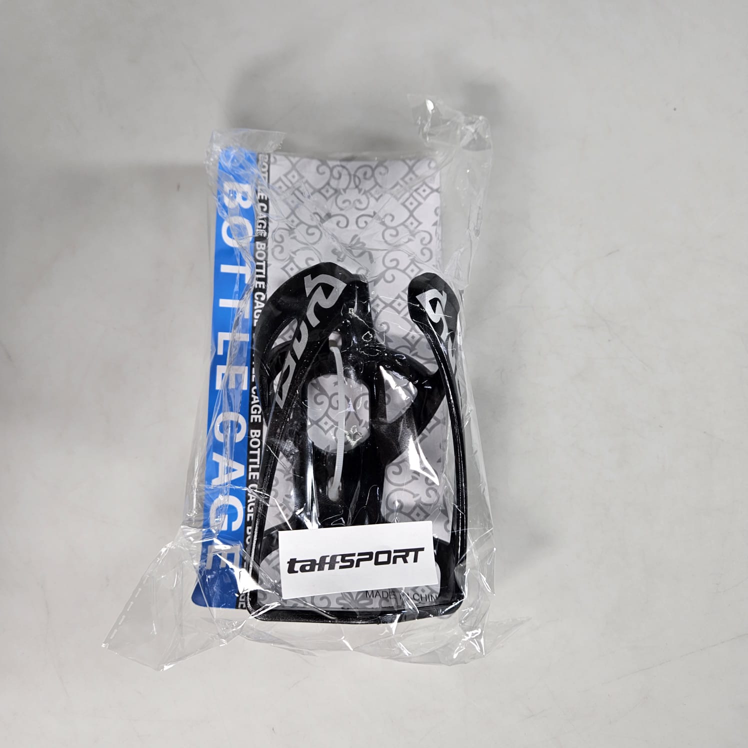 TaffSPORT Holder Botol Minum Sepeda Adjustable Bike Bottle Cage - ZL0211 Gambar produk TaffSPORT Holder Botol Minum Sepeda Adjustable Bike Bottle Cage - ZL0211 - Kemasan