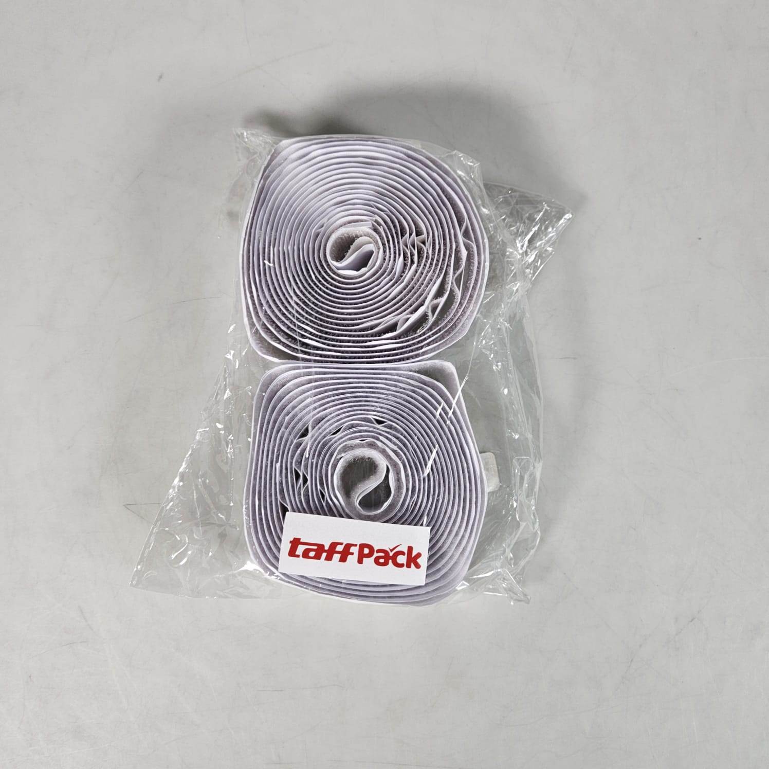 TaffPACK Velcro Hook and Loop Self Adhesive Nylon Tape 3M 25mm - RI210 Gambar produk TaffPACK Velcro Hook and Loop Self Adhesive Nylon Tape 3M 25mm - RI210 - Kemasan